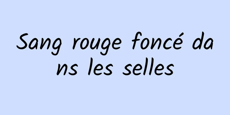 Sang rouge foncé dans les selles