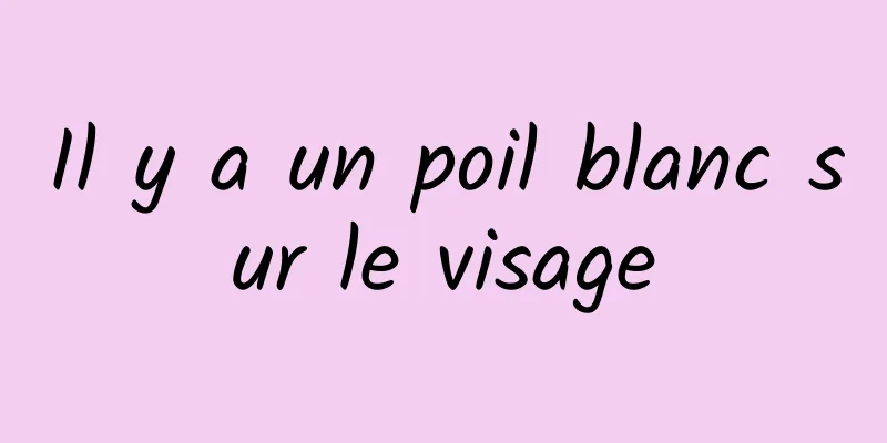 Il y a un poil blanc sur le visage