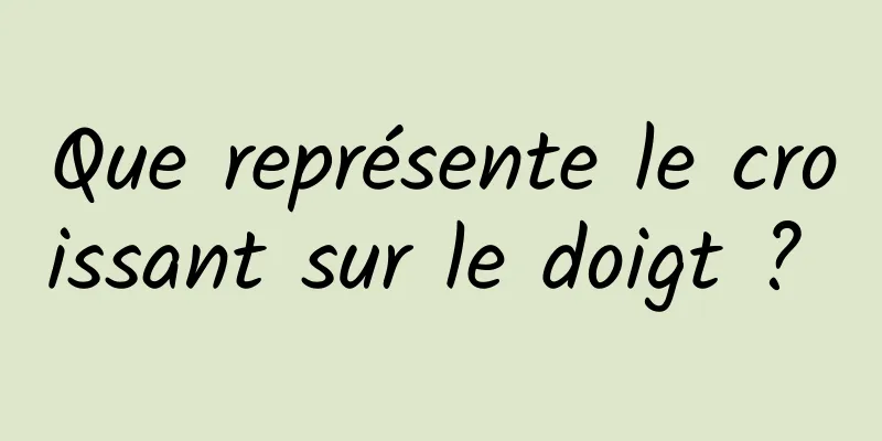 Que représente le croissant sur le doigt ? 